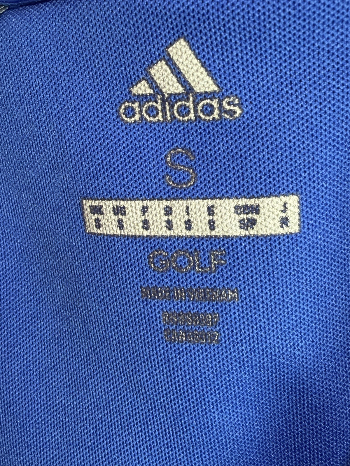 adidas Polo brand and size label