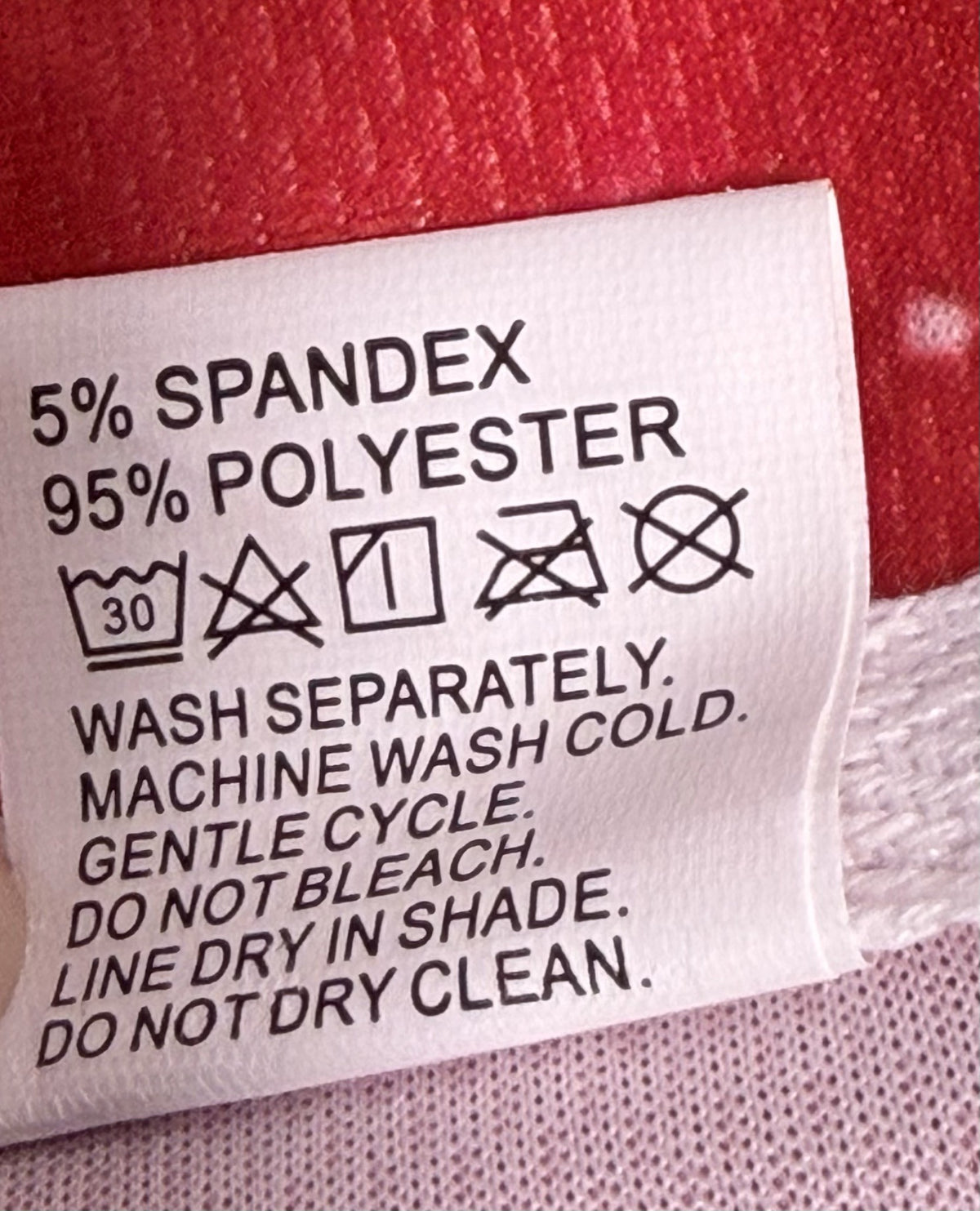 Women's Golf Sleeveless Polo care and fabric label