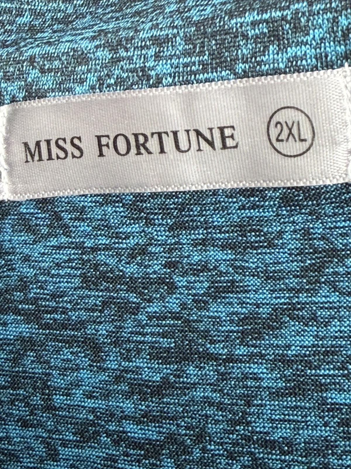 Miss Fortune Short-Sleeve Quarter-Zip Polo brand and size label