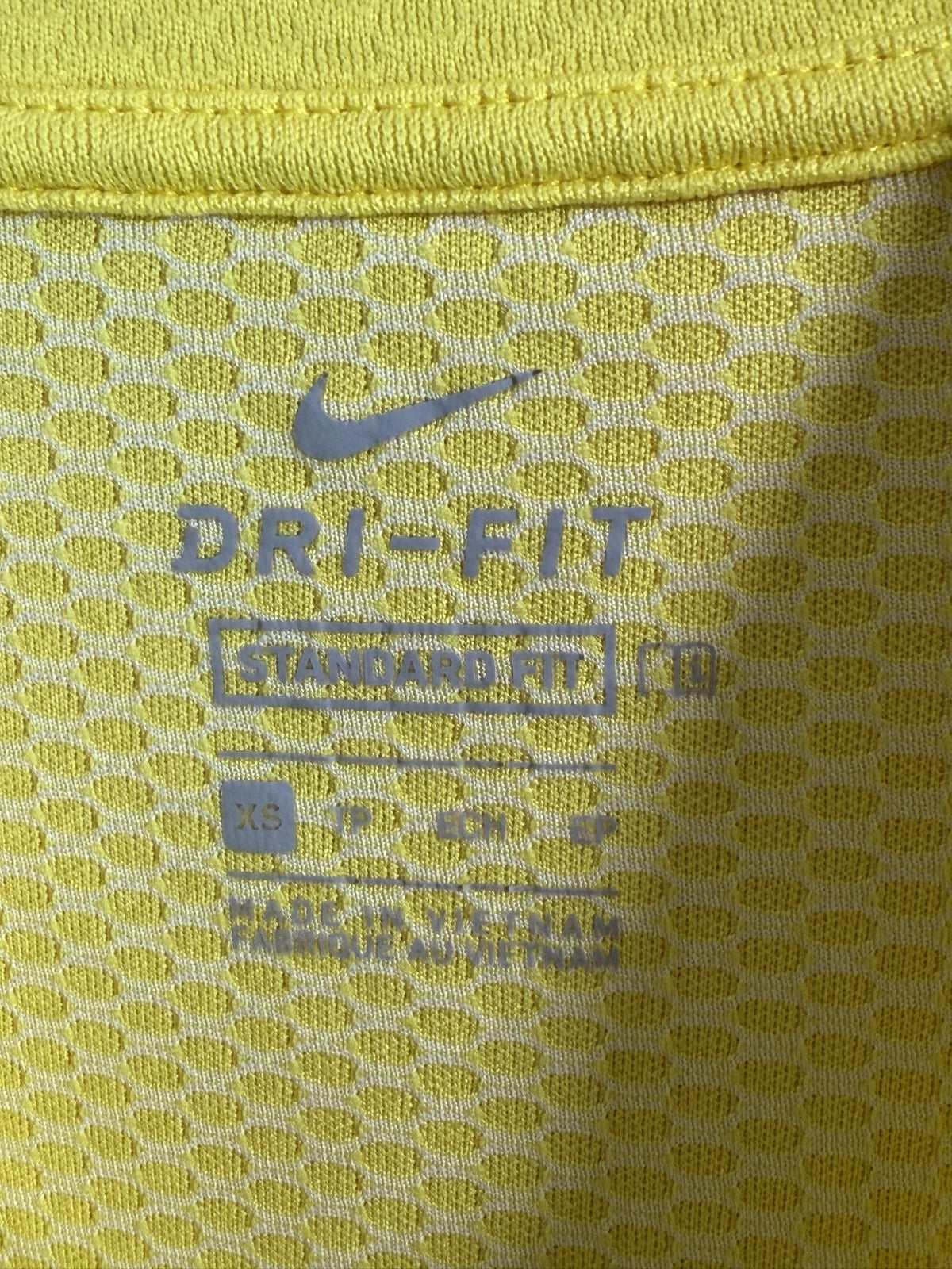 Nike Short-Sleeve Mock-Zip brand and size label