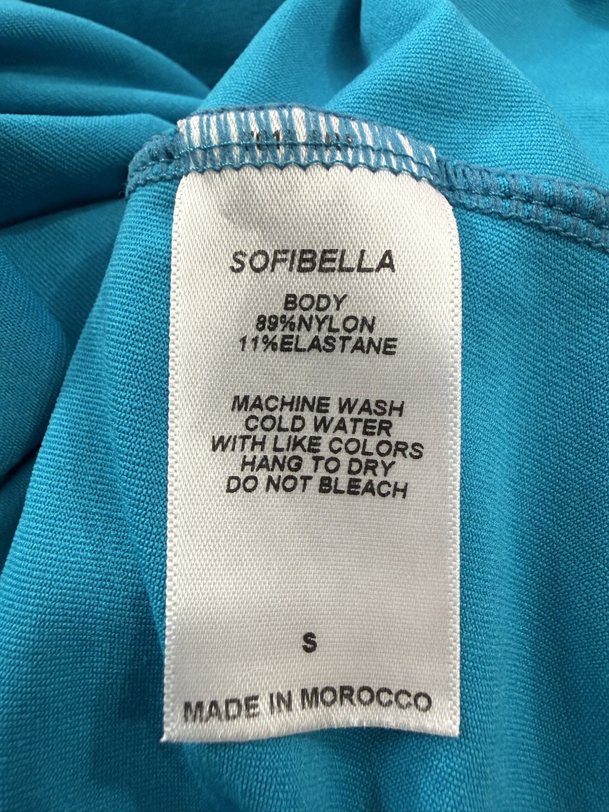Sofibella Long-Sleeve Top care and fabric label