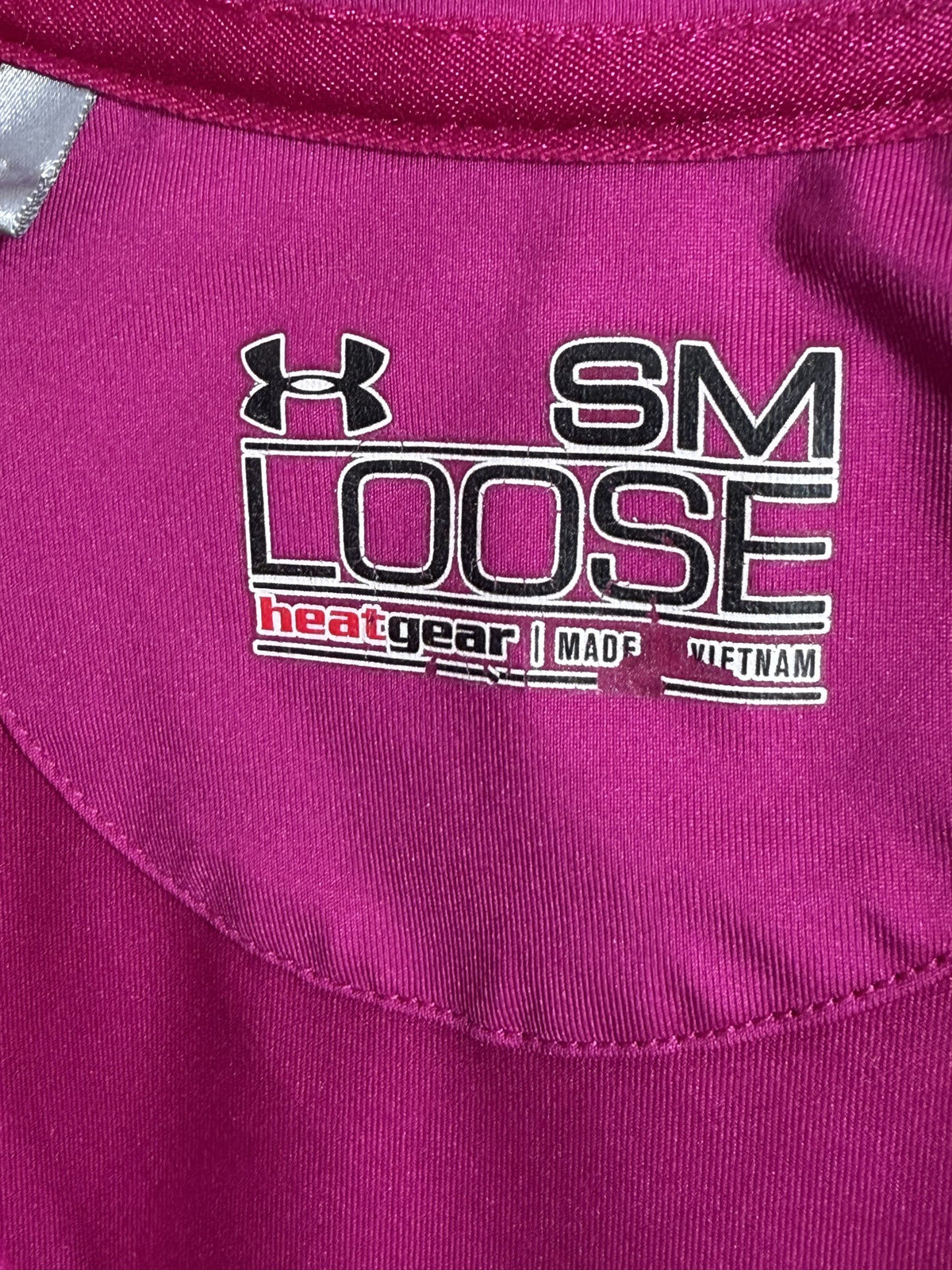 Under Armour Short-Sleeve Polo brand and size label