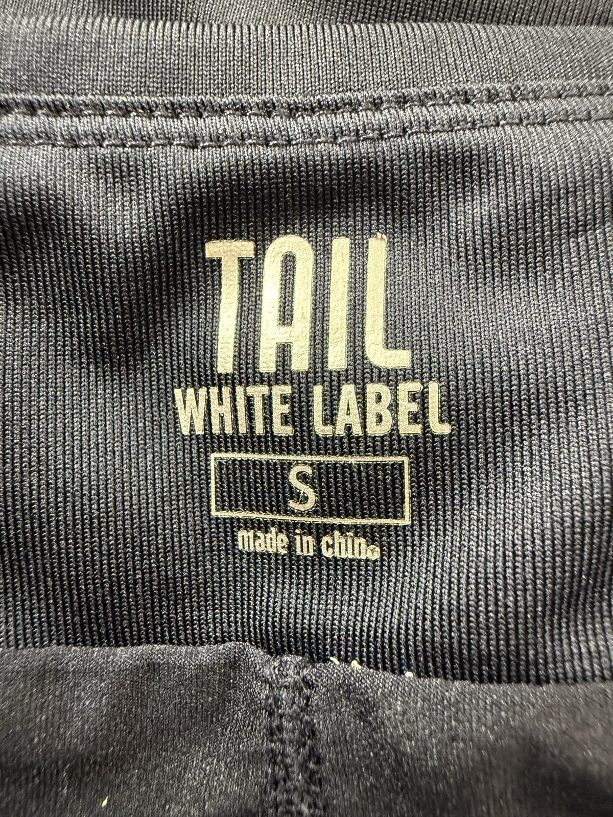 Tail Skort brand and size label