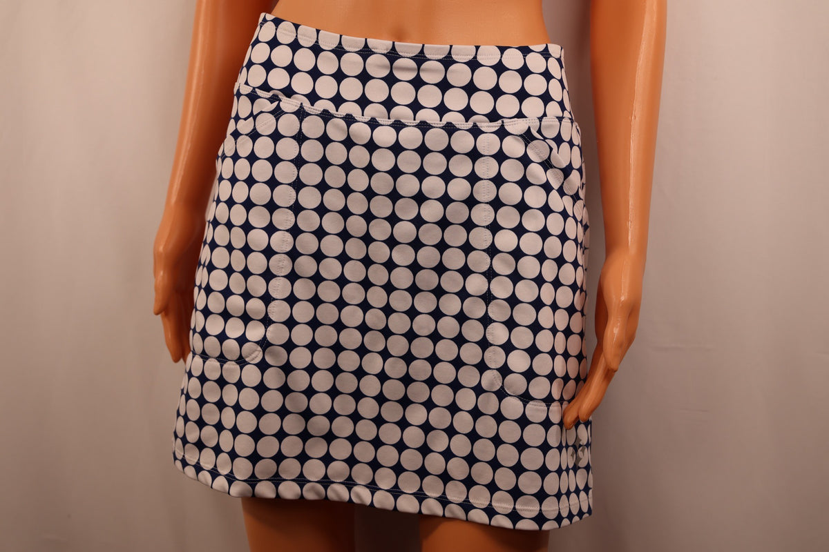 JoFit skort, navy and white polka dot, front