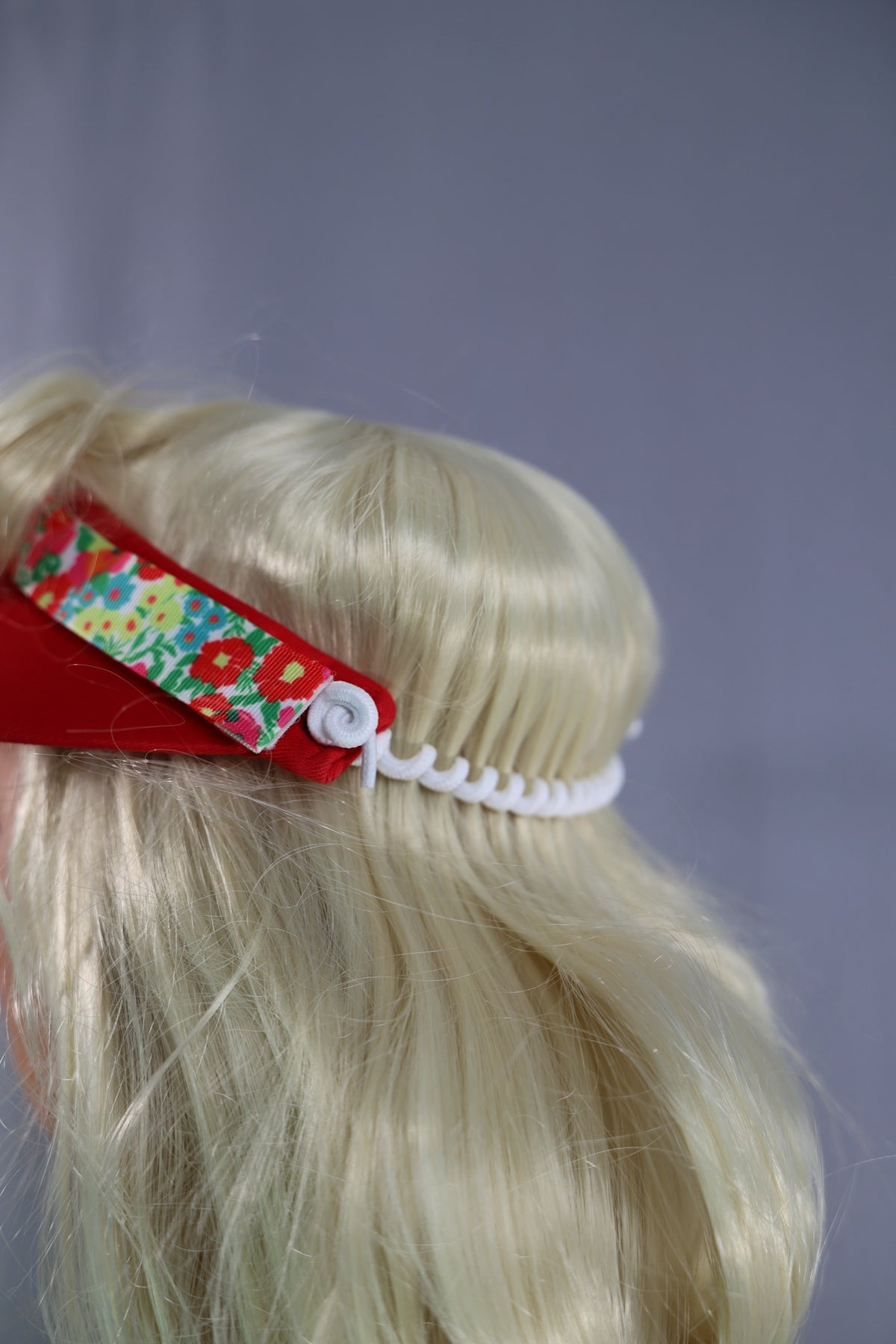 Visor-Versa red visor, floral band and adjustable back