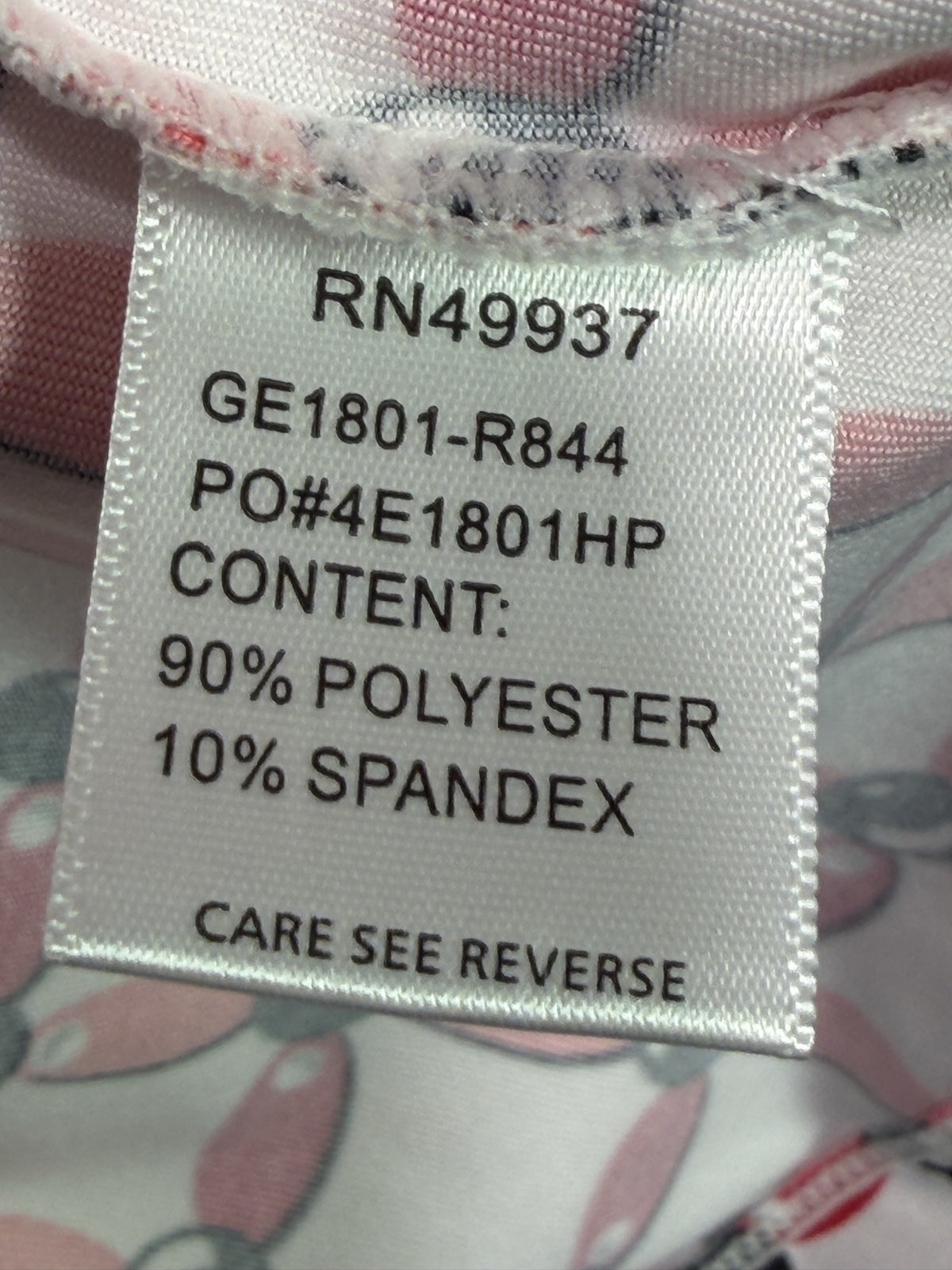 Tail Short-Sleeve Top care and fabric label