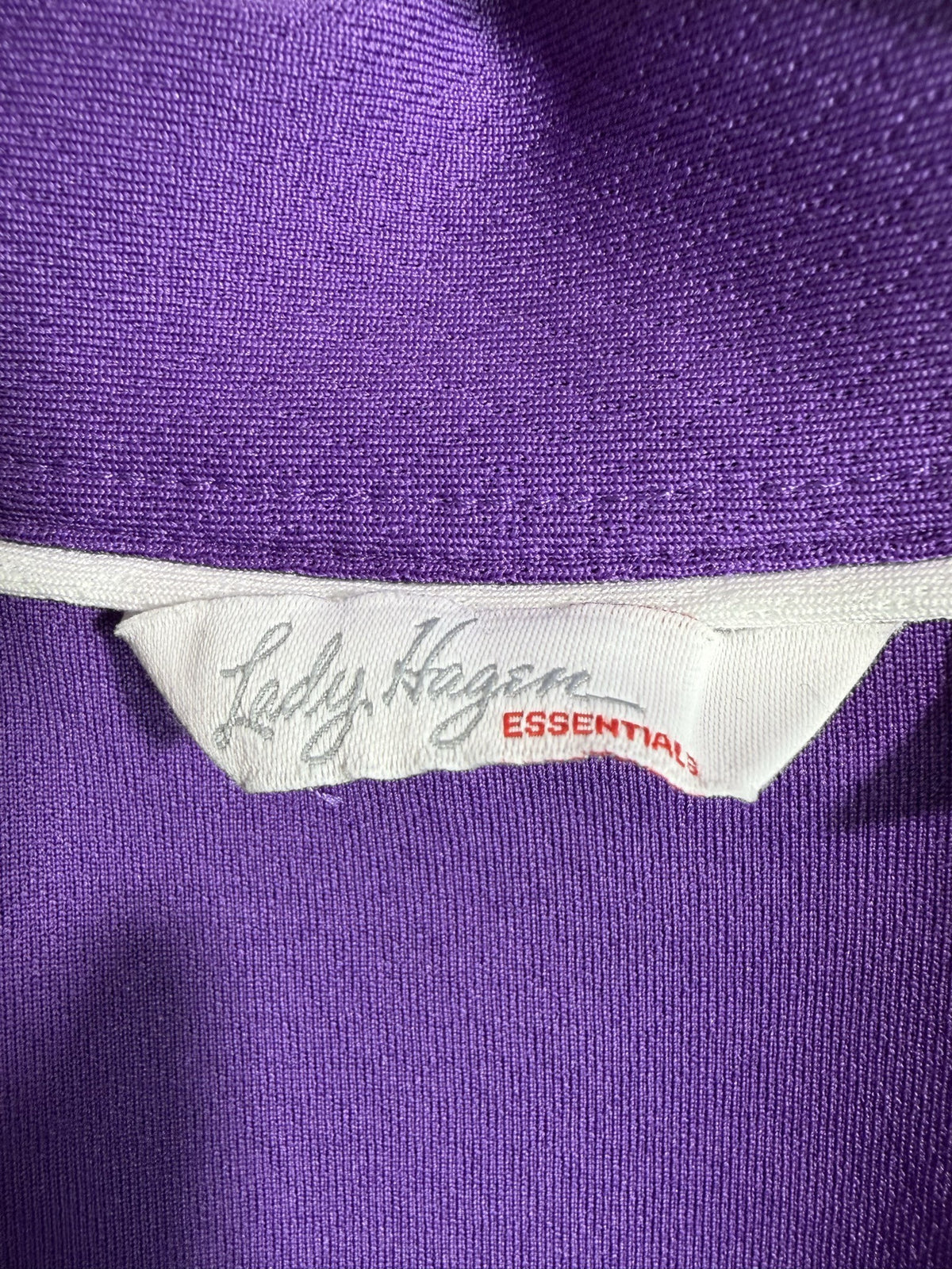 Lady Hagen Sleeveless Polo brand and size label