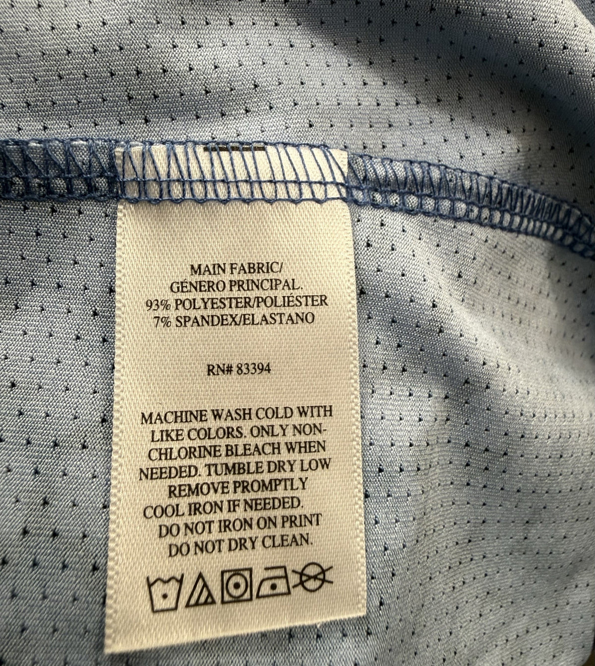Etonic Sleeveless Quarter-Zip care and fabric label