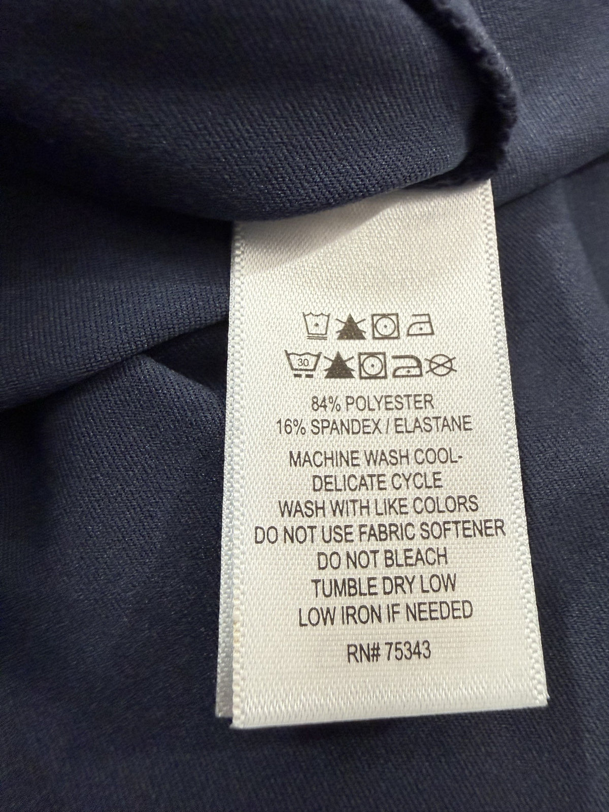Tommy Bahama Sleeveless Quarter-Zip care and fabric label