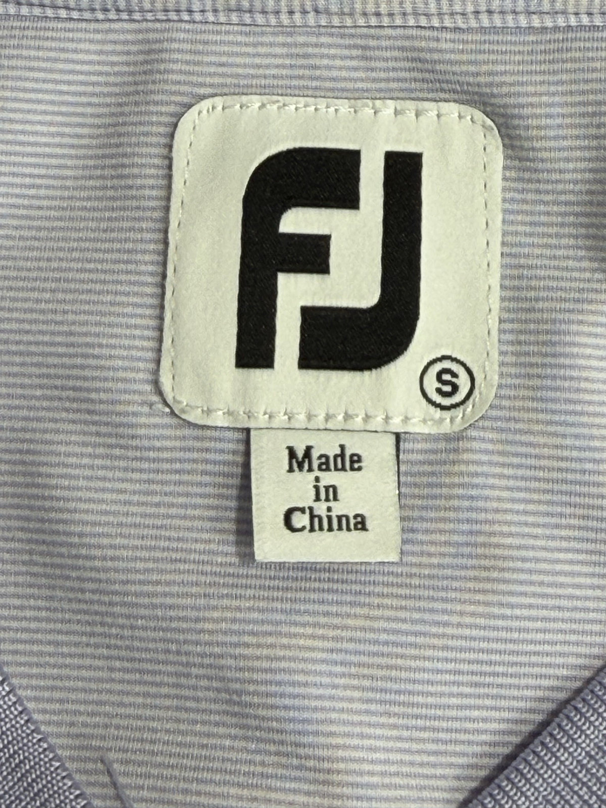 FootJoy polo brand and size label