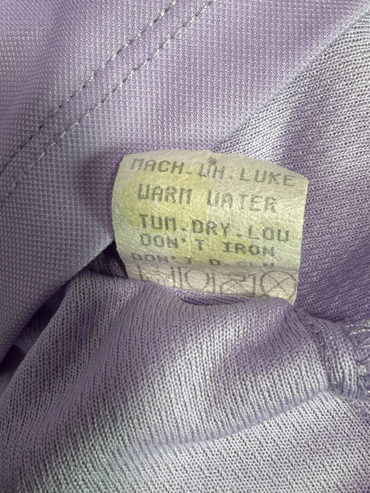 Tail Sleeveless Polo care and fabric label
