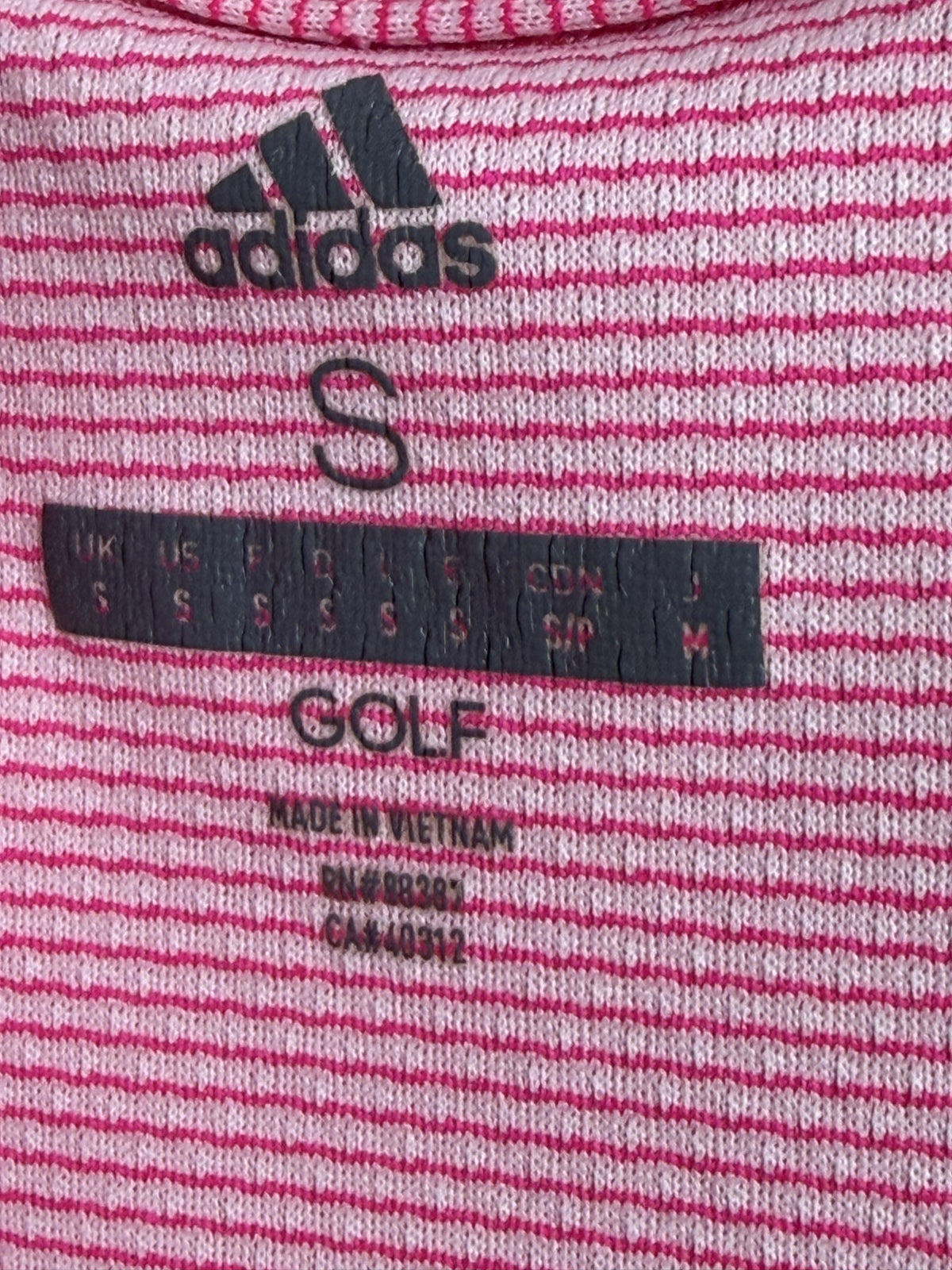 adidas Sleeveless Polo brand and size label