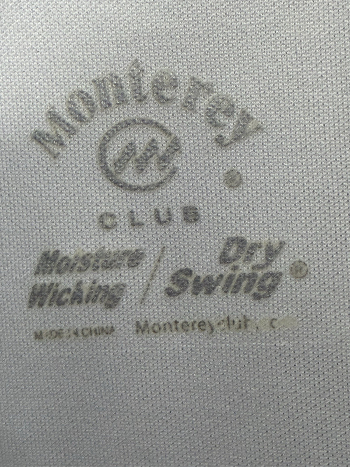 Monterey Club Short-Sleeve Polo brand and size label