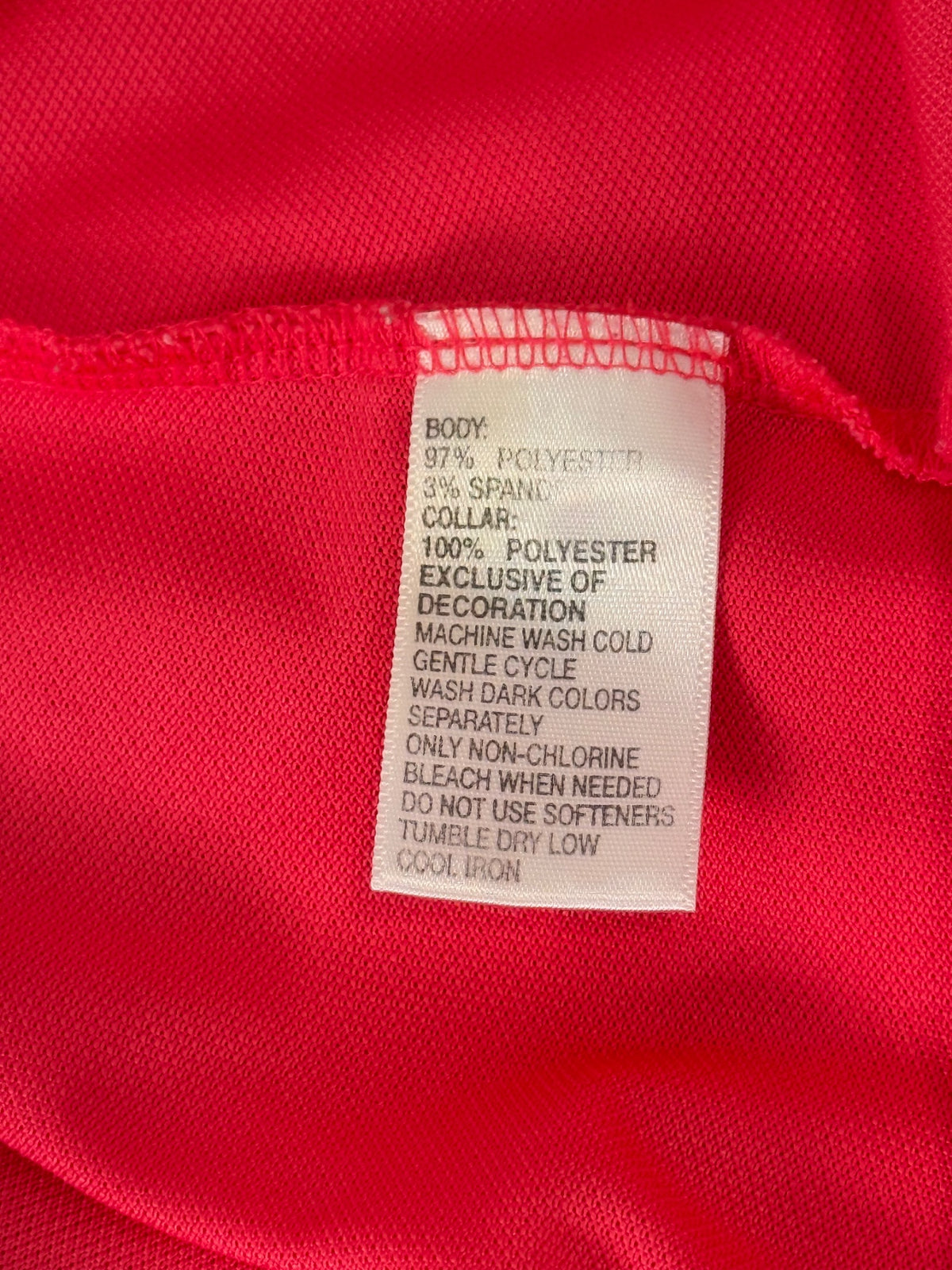 Greg Norman fabric and care label