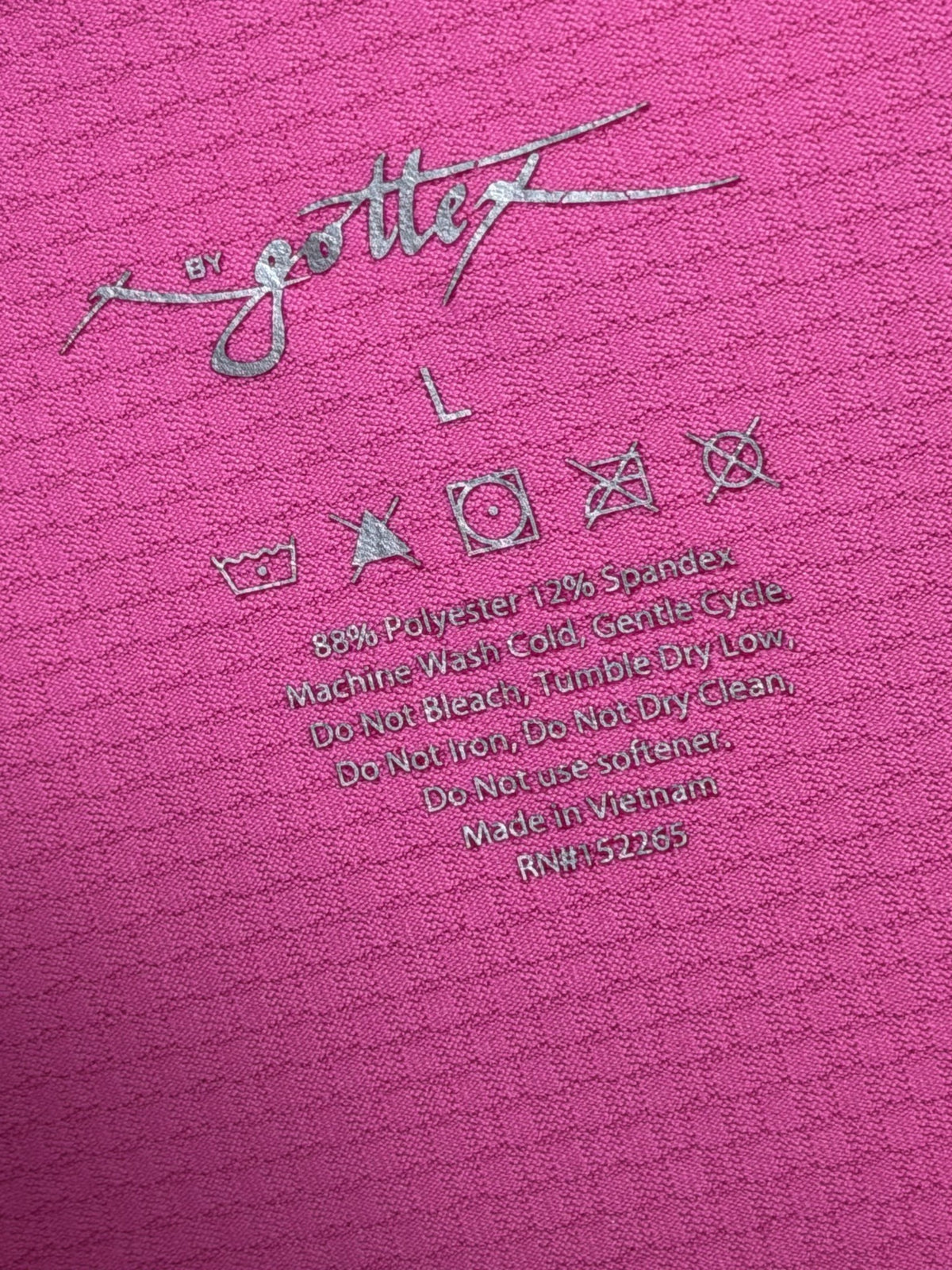 Gottex Sleeveless Polo brand and size label