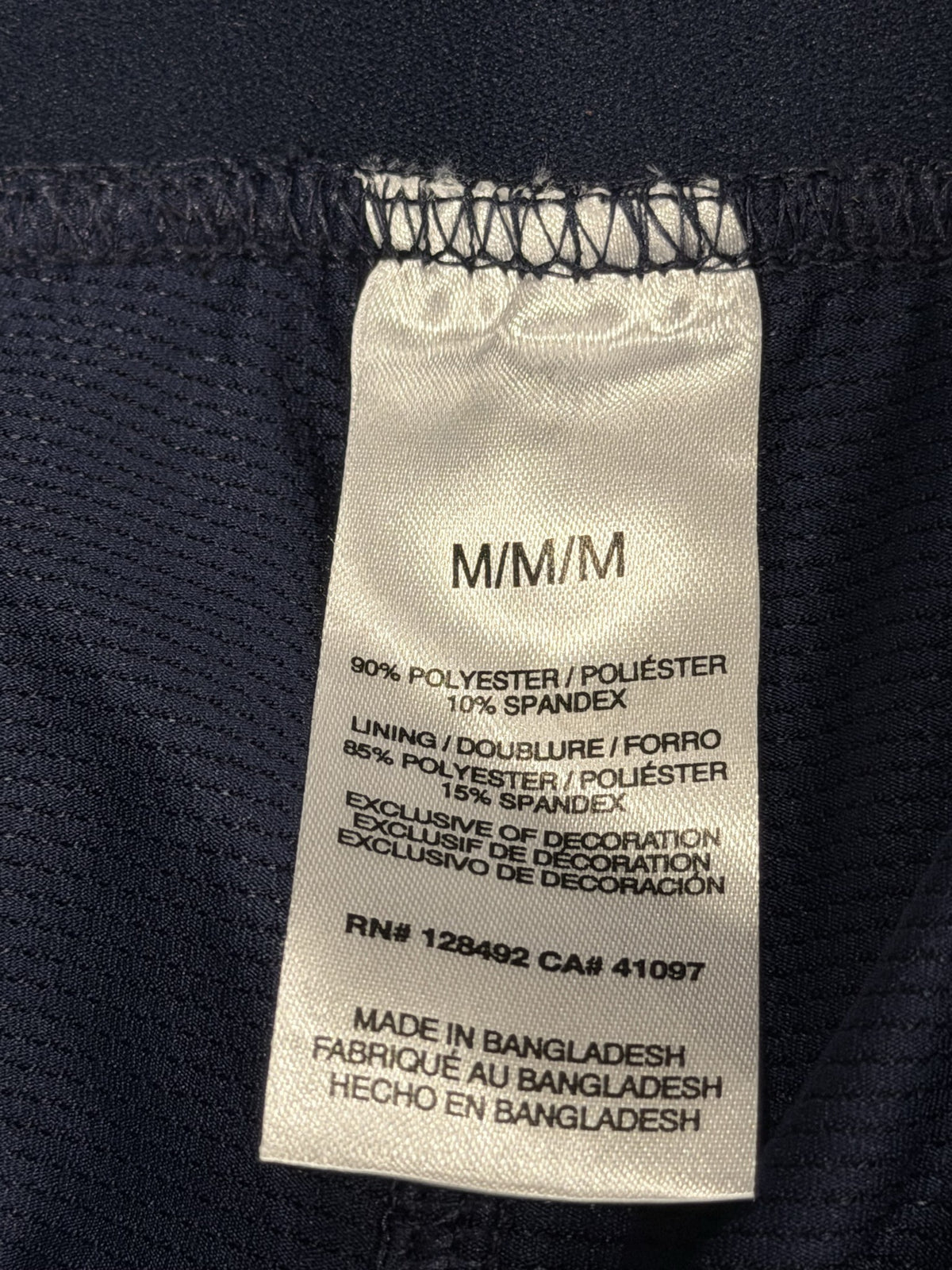 Greg Norman navy skort, fabric content label