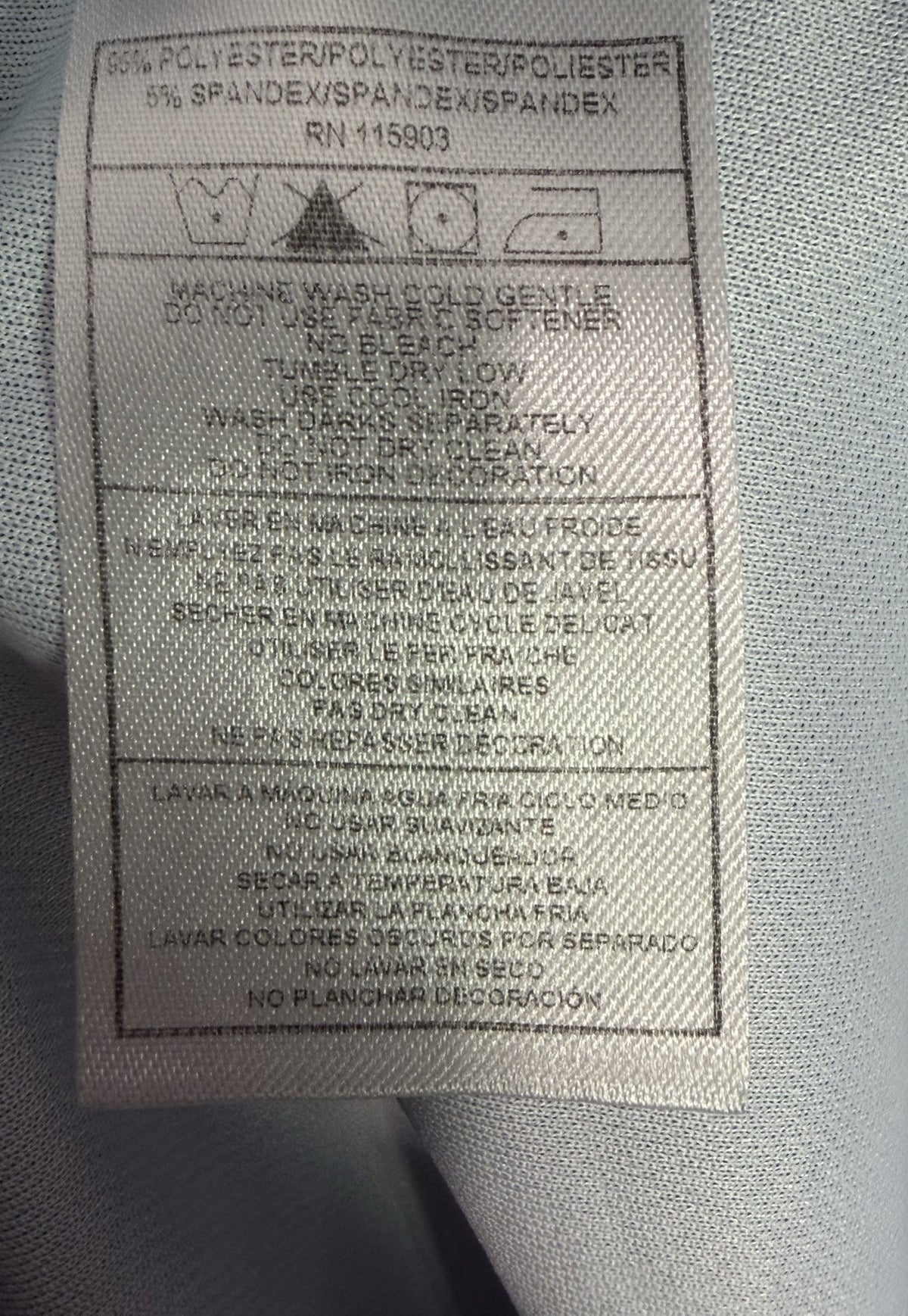 Bermuda Sands Sleeveless Quarter-Zip care and fabric label