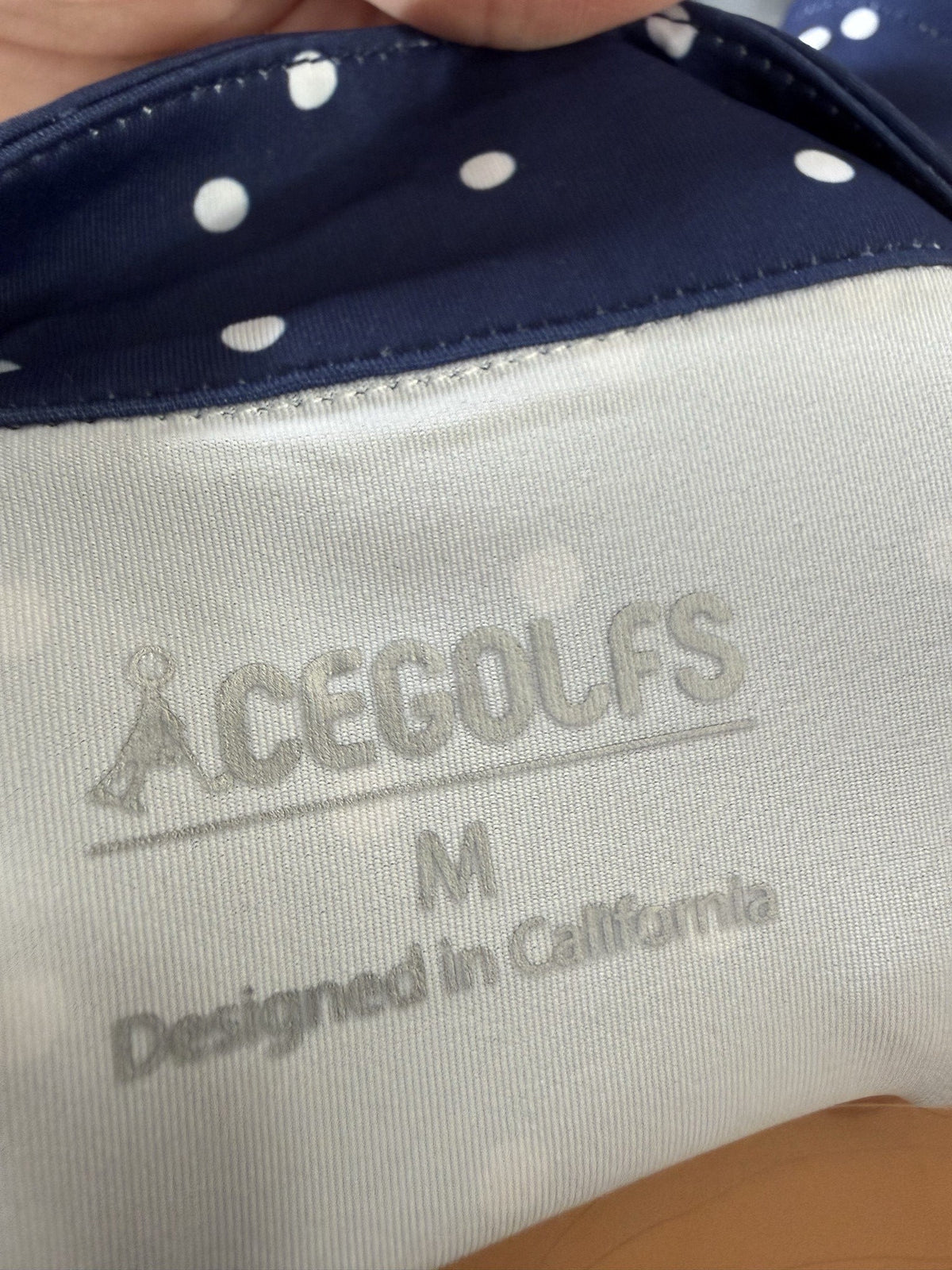 ACEGOLFS Sleeveless Quarter-Zip Golf Dress brand and size label