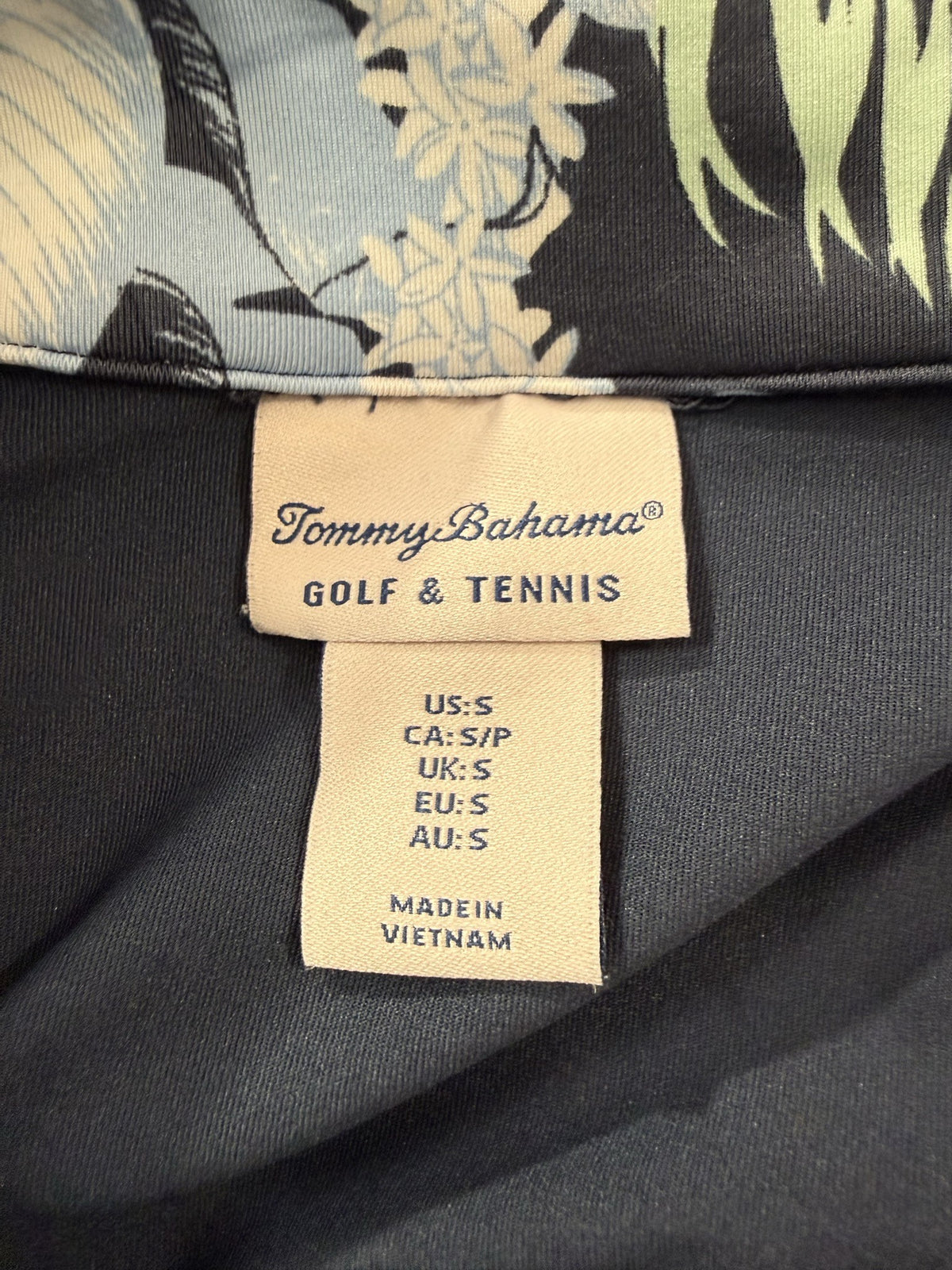 Tommy Bahama Sleeveless Quarter-Zip brand and size label