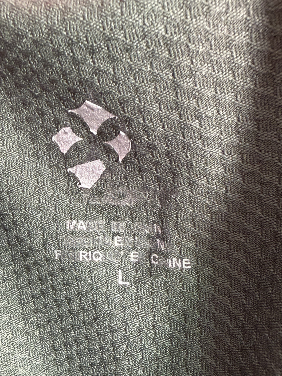 Jofit Sleeveless Quarter-Zip Polo brand and size label
