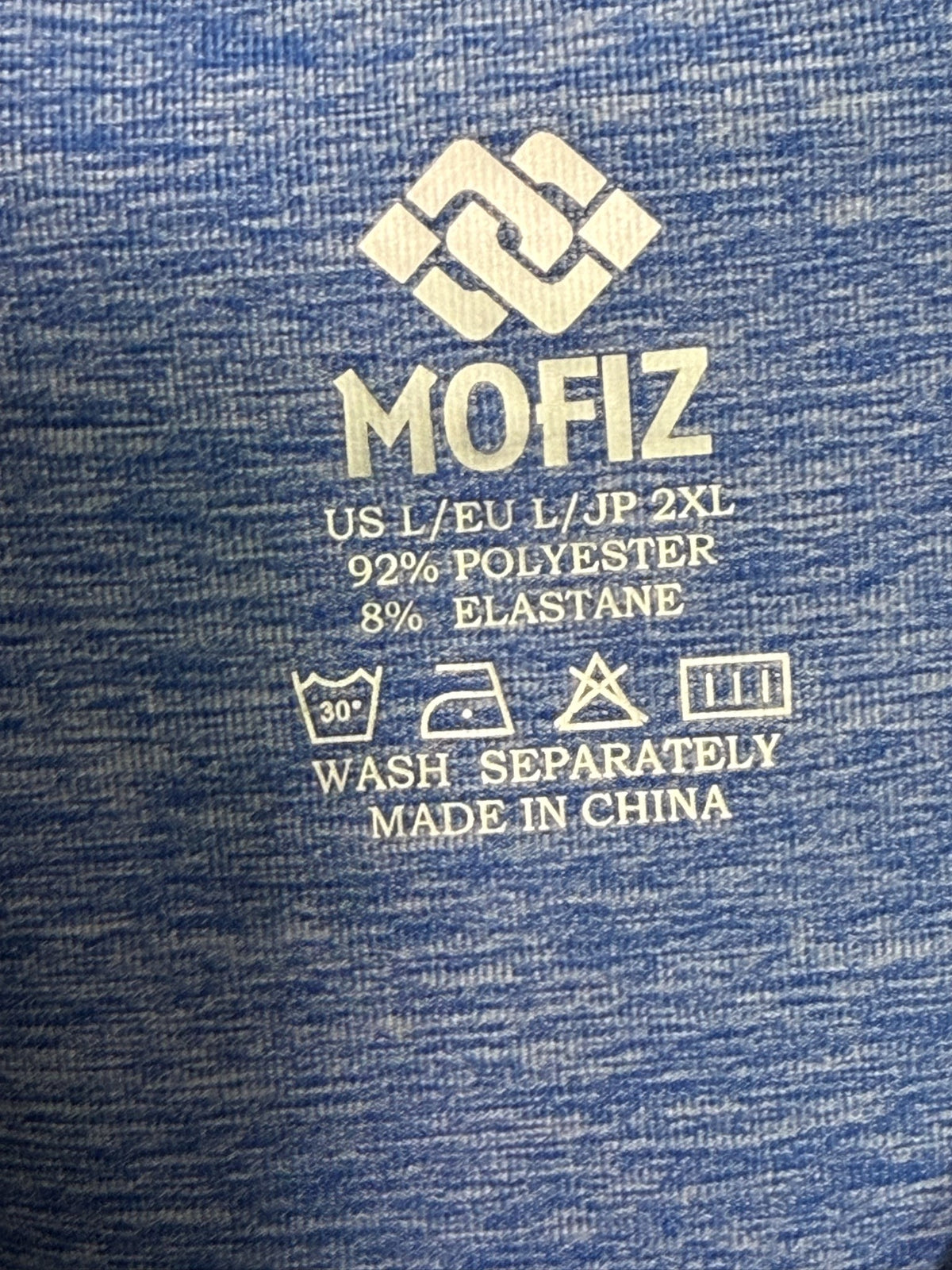 Mofiz Sleeveless Polo brand and size label
