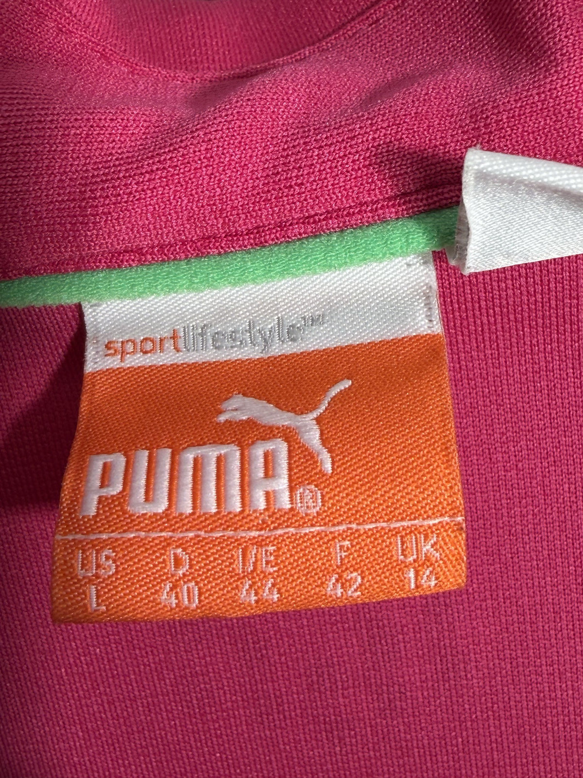 Puma Sleeveless Polo brand and size label