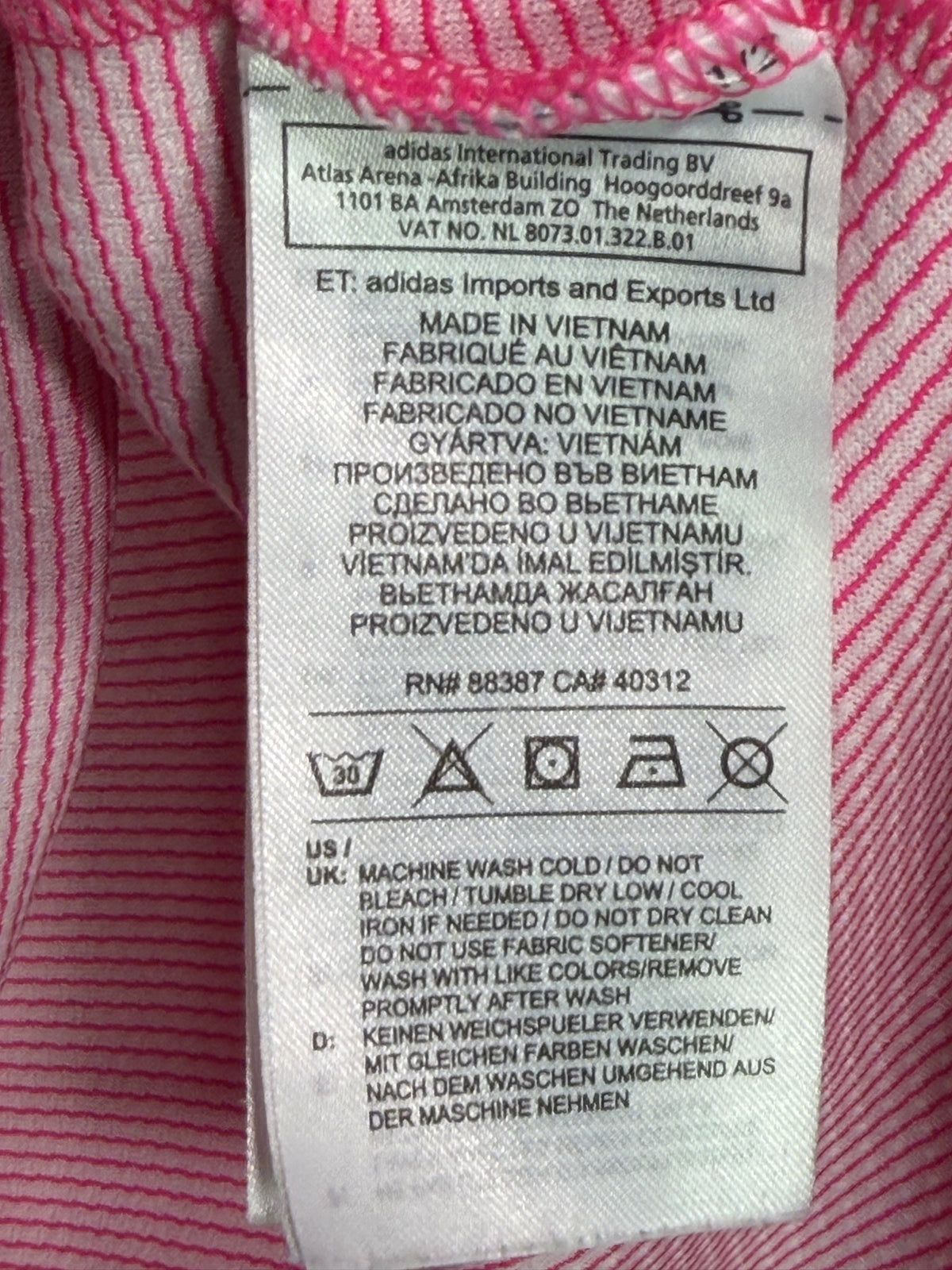 adidas Sleeveless Polo care and fabric label