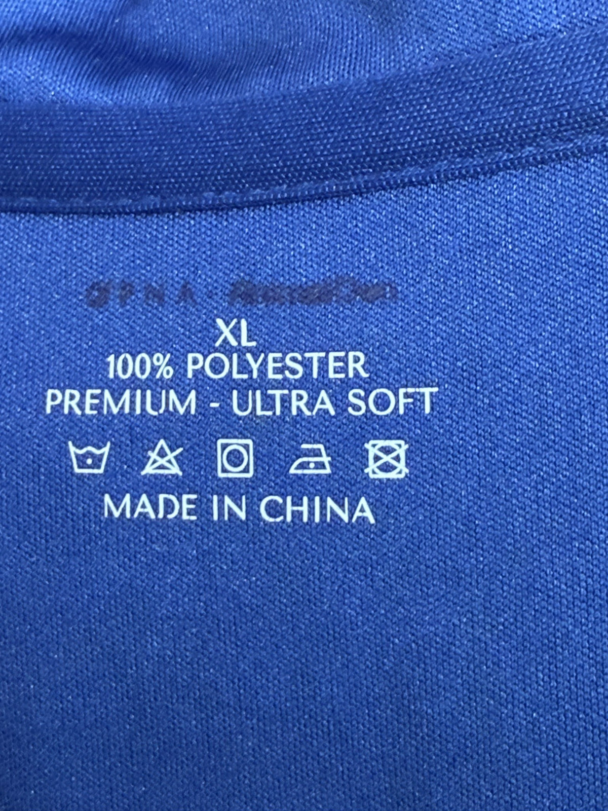 OPNA Polo brand and size label