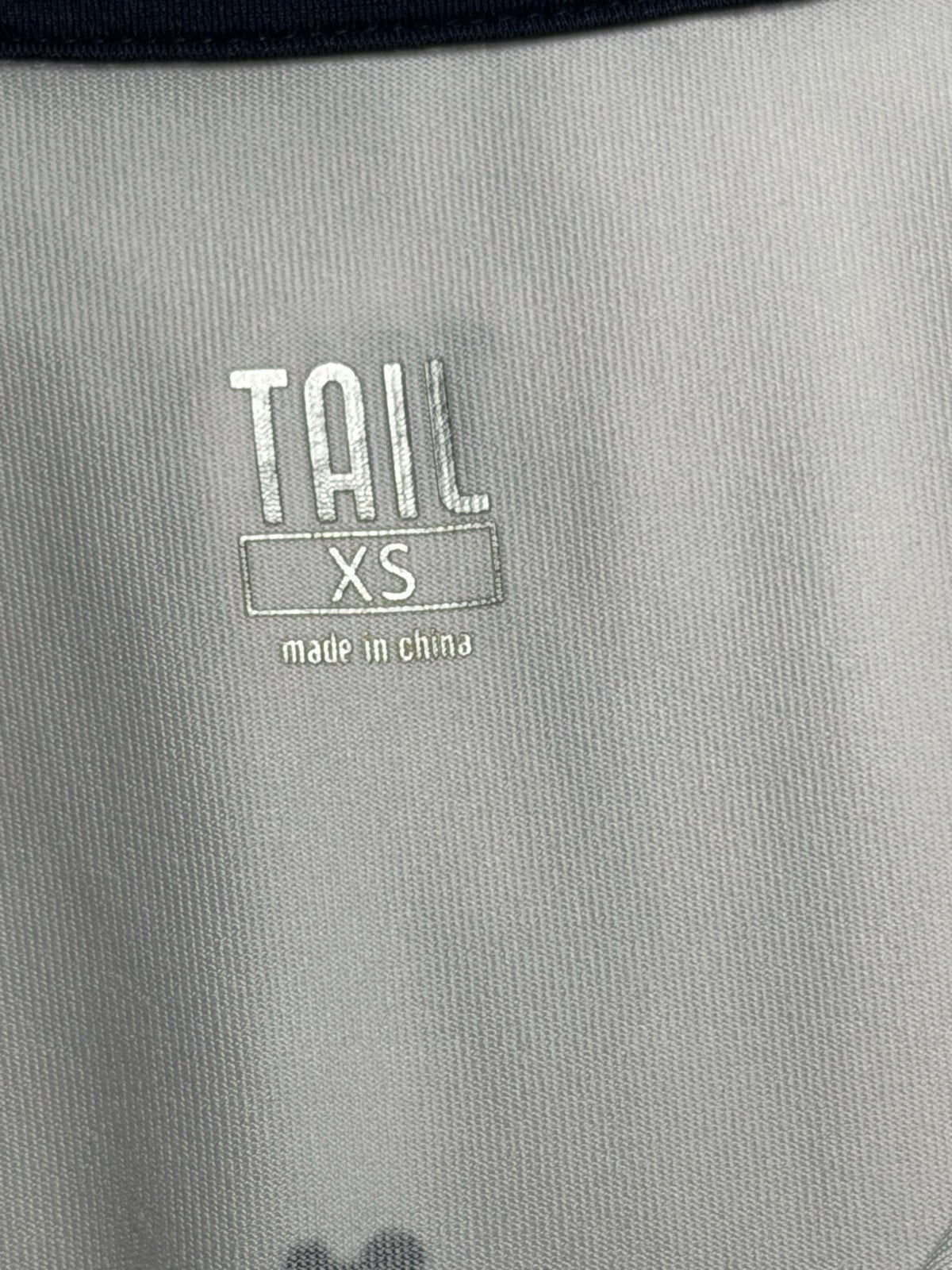 Tail brand and size label