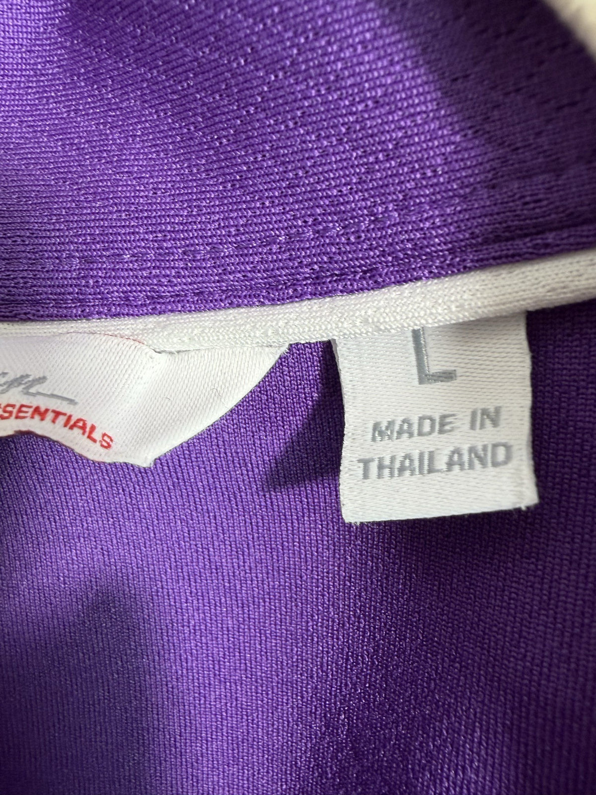 Lady Hagen Sleeveless Polo care and fabric label
