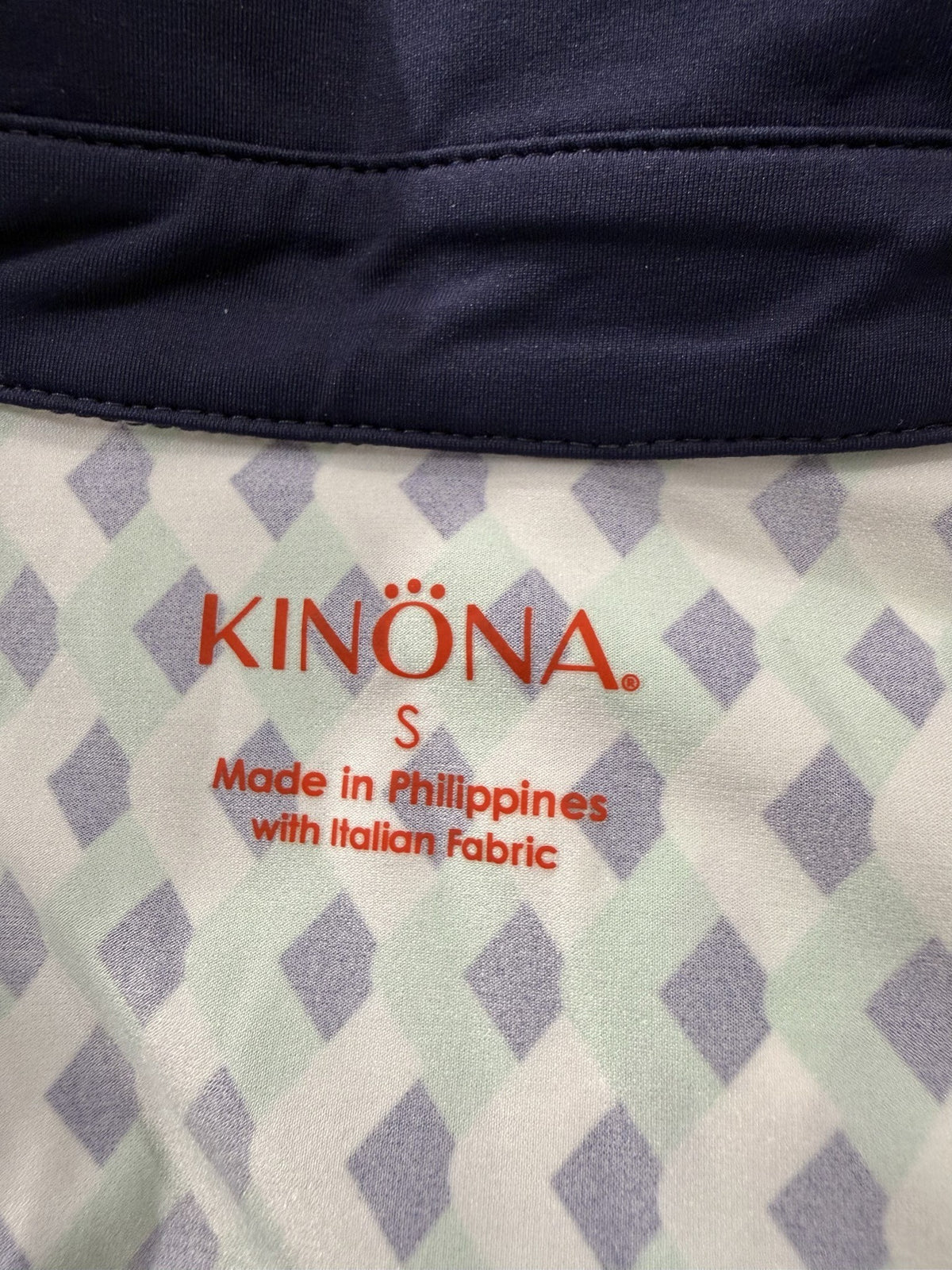KINONA Long-Sleeve Polo brand and size label