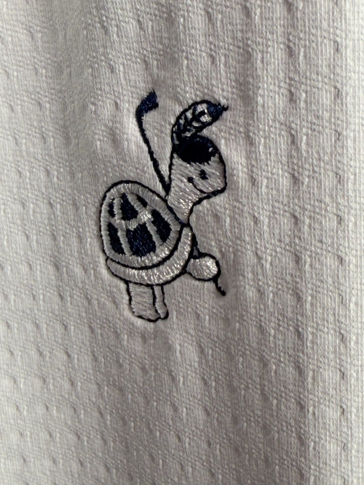 IBKUL Short-Sleeve Quarter-Zip care and fabric label